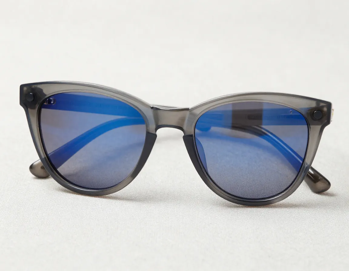 Shiny chalky gray frame with adaptive sapphire blue transition lenses