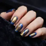7 Stunning Cat Eyes Blue Nails Designs for a Mystic Manicure